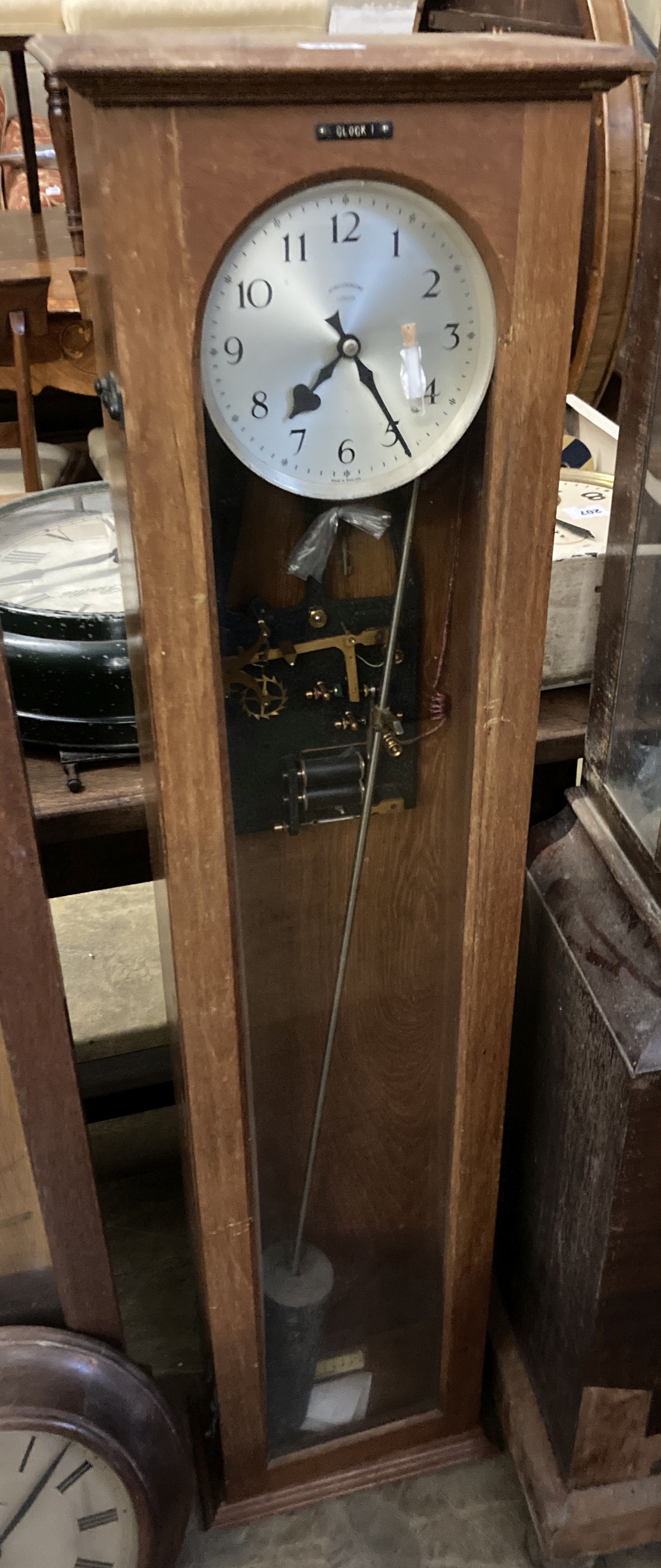 A mid 20th century teak cased Synchronome master clock, height 128cm